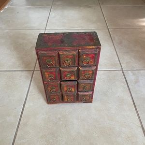 Hosley Red Wooden 12 Drawer Chest